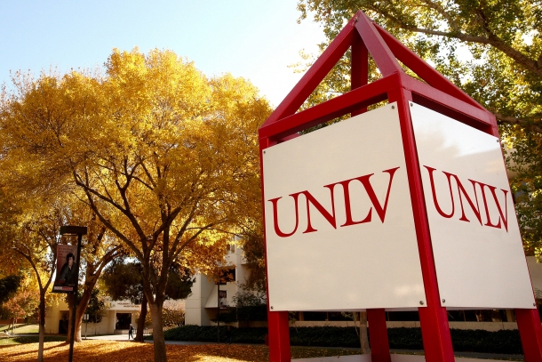 Close-up, day-time shot of cube shaped U N L V sign.